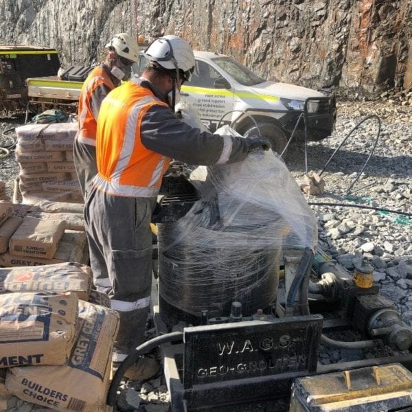 Grout Pump & Mixer Pneumatic Geogrouter being unpacked from transport to the work site.