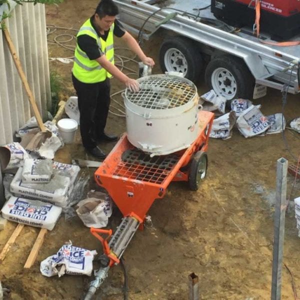 Grout Pump & Mixer 415 Volt Large Rental Perth in use on a building site