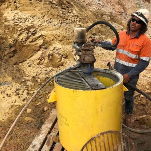 Product Image: Small Pneumatic Grout Pump and Mixer working on an active site. This product is available for rent Perth