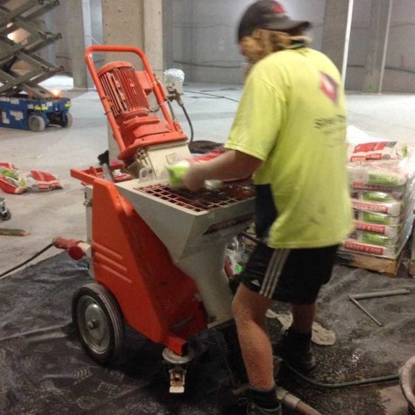 Compact Continuous Mixing Grout Pump in use on a work site. Hire a Continuous Grout Pump for your next project near Perth