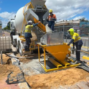 The expert team from Grout Pump Hire Perth, on a contracted metro work site with the required grout pump system to complete the work required on the roadside.