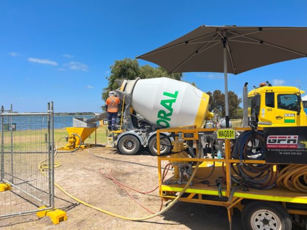 Grout pump system in use with trailer on site in Perth. This set up with an expert team is available to hire under contract.