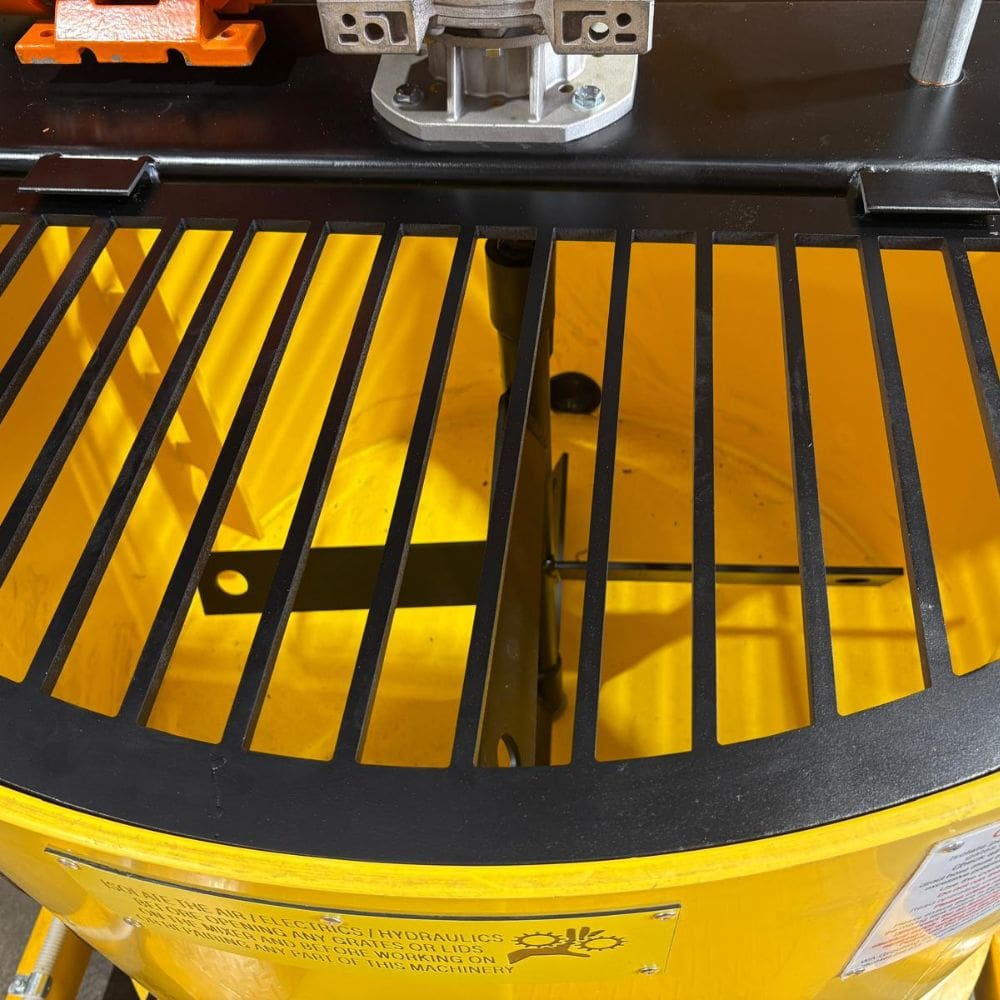 Close-up of the WAGS 1000L Paddle Mixer safety grate and internal mixing paddles.